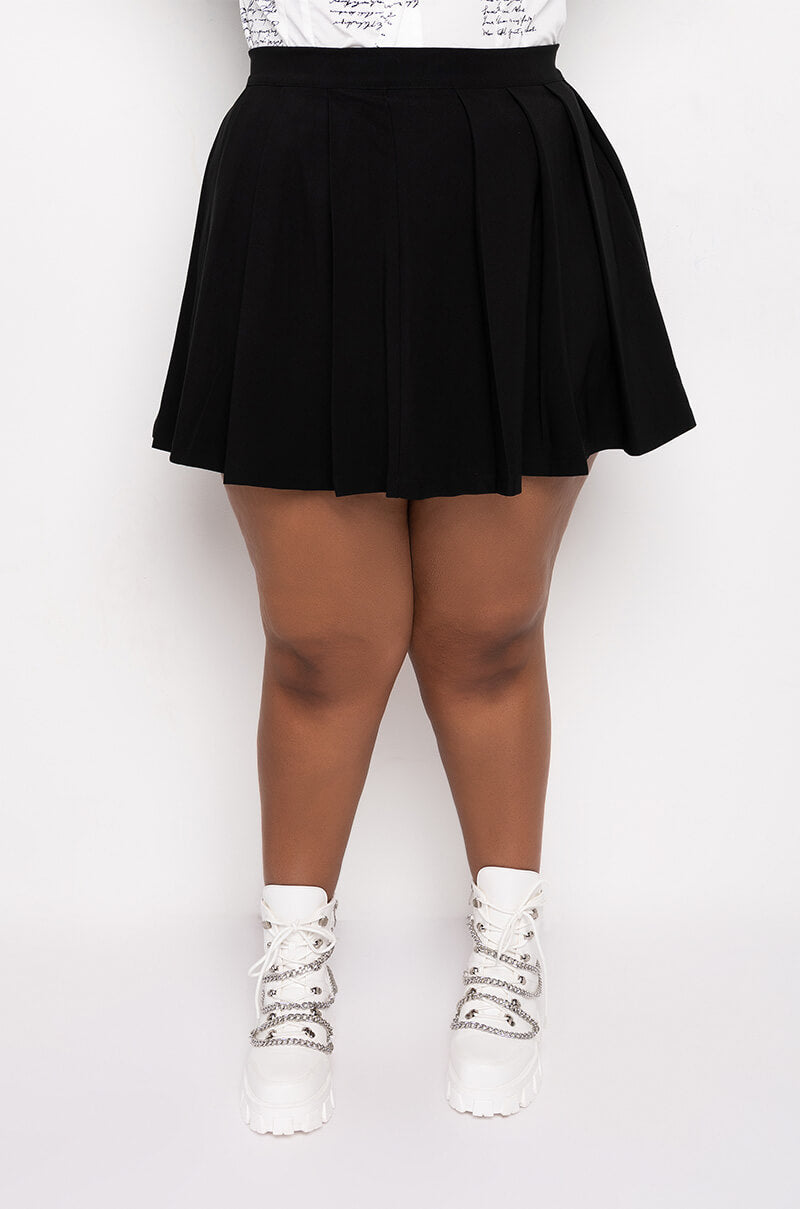 ISLAND PLEATED MINI SKIRT